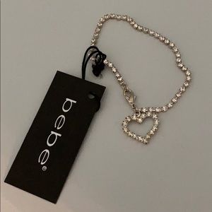NEW - BEBE 7” Diamond Tennis bracelet with heart.